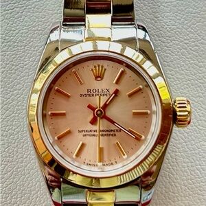 Ladies Rolex Oyster Perpetual ref #67183 18k and SS. PRISTINE.